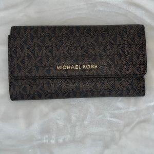 Michael Kors Full Size Large Tri Fold Wallet in Brown